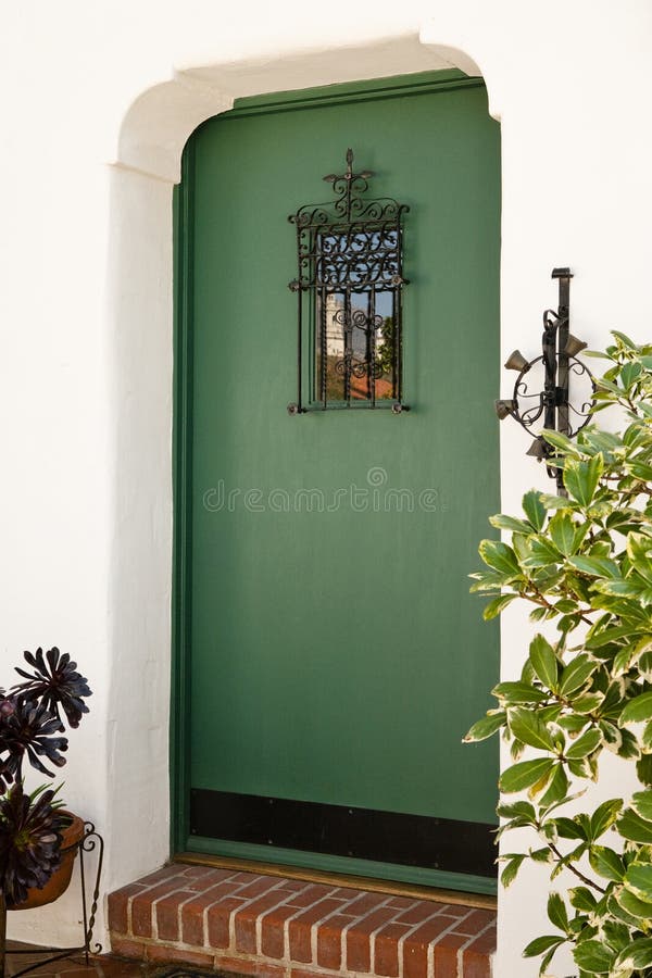 Front Door of aHome. Exterior view of a front door to a residence with a reflection in the window royalty free stock photography